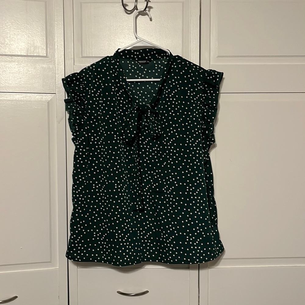 Green polka dot blouse
